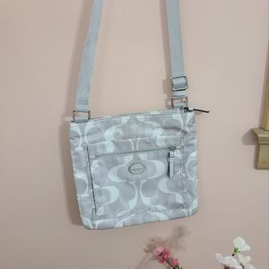 COACH cross body handbag silver and white